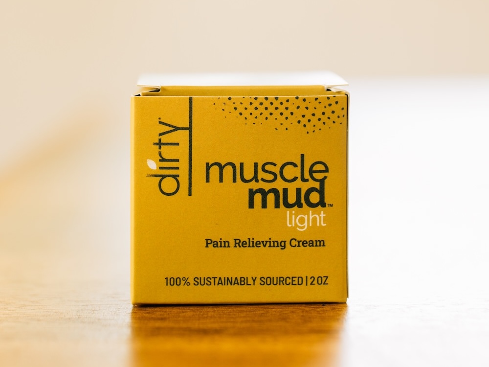 a single jar of muscle mud lite natural pain relief cream