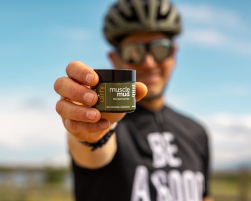cyclist-holding-musclemud-jar.jpg cyclist-holding-musclemud-jar.jpg